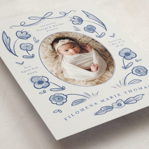 This is a delft blue birth announcement postcards with standard by Ani Somi called painted flowers printing on signature in postcard