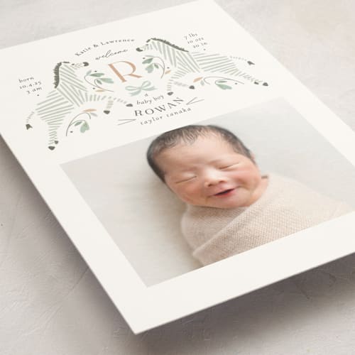 This is a seafoam birth announcement postcards with standard by Griffinbell Paper Co. called hearts and stripes printing on signature in postcard