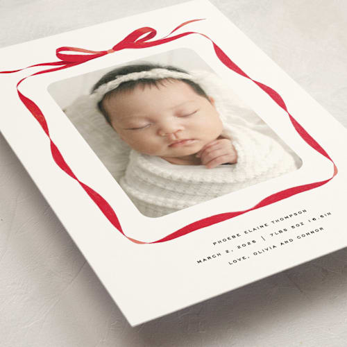 This is a crimson birth announcement postcards with standard by Olivia Kanaley Inman called bow printing on signature in postcard