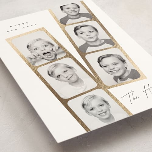 This is a snowfall christmas postcards with foil pressed by Leah Bisch called snapshots printing on signature in postcard