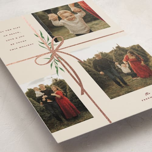 This is a burgundy christmas postcards with foil pressed by Susan Zinader called holiday gifts printing on signature in postcard