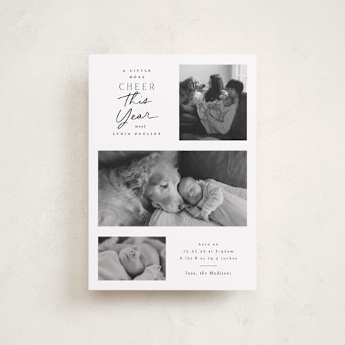 This is a snow babys first christmas with standard by Everett Paper Goods called merrier this year printing on recycled smooth signature in petite