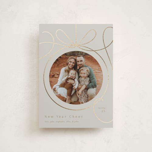 This is a cinder petite holiday cards with foil pressed by Erin German called ornament frame printing on recycled smooth signature in petite