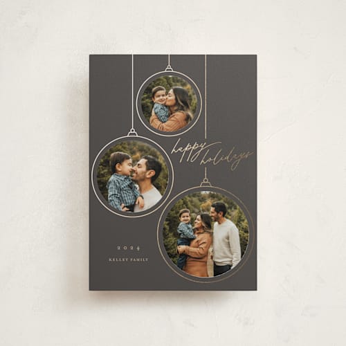 This is a coal petite holiday cards with foil pressed by Erin German called ornaments printing on recycled smooth signature in petite