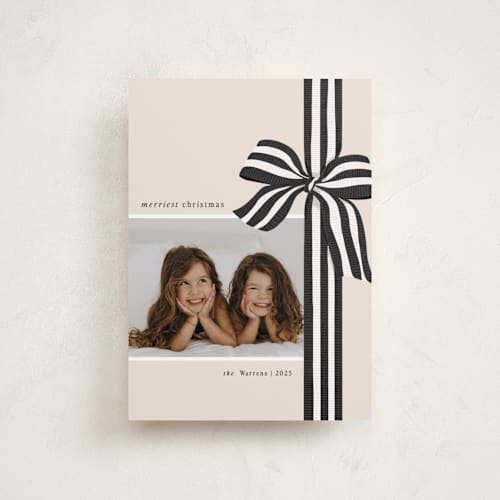 This is a charcoal petite holiday cards with standard by Angela Marzuki called ribbon wrapped printing on recycled smooth signature in petite