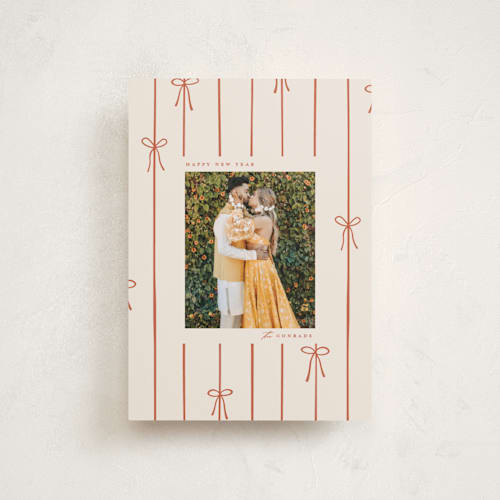 This is a cider petite holiday cards with standard by Ellen Schlegelmilch called lines of bows printing on recycled smooth signature in petite