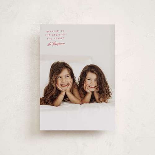 This is a cranberry petite holiday cards with standard by Heather Schertzer called believe printing on recycled smooth signature in petite