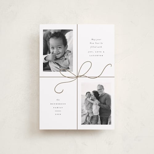 This is a snow petite holiday cards with standard by Emily Betts called bow two printing on recycled smooth signature in petite