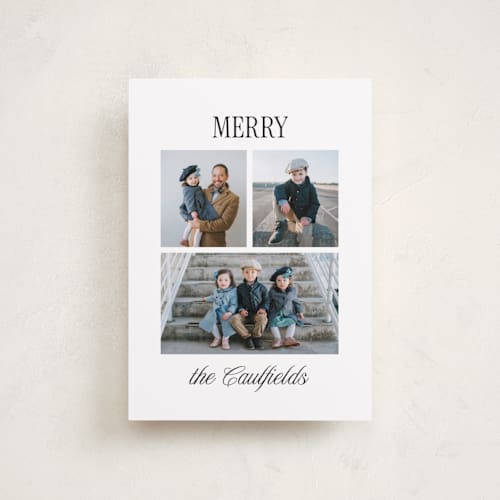 This is a icicle petite holiday cards with standard by Kamala Nahas called classic merry triple printing on recycled smooth signature in petite