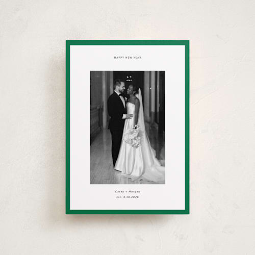 This is a pine petite holiday cards with standard by Wendy Chung called classic border printing on recycled smooth signature in petite