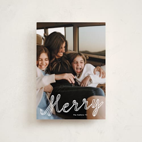 This is a snow petite holiday cards with standard by Lori Wemple called a merry ribbon printing on recycled smooth signature in petite