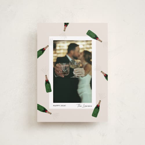 This is a eggnog petite holiday cards with standard by Shari Margolin called popping bottles printing on recycled smooth signature in petite