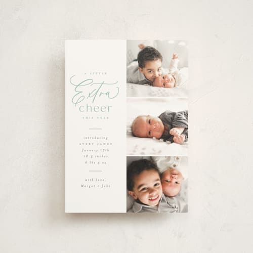 This is a mint babys first christmas with standard by Everett Paper Goods called extra cheer here printing on signature in postcard