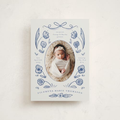 This is a delft blue petite birth announcements with standard by Ani Somi called painted flowers printing on signature in petite