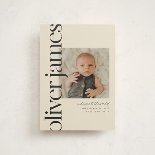 This is a cream birth announcement postcards with standard by Ellen Schlegelmilch called editorial printing on signature in postcard