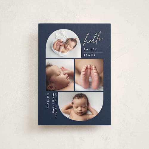 This is a navy birth announcement postcards with foil pressed by Carolyn MacLaren called so current printing on signature in postcard