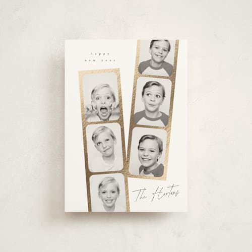 This is a snowfall christmas postcards with foil pressed by Leah Bisch called snapshots printing on signature in postcard