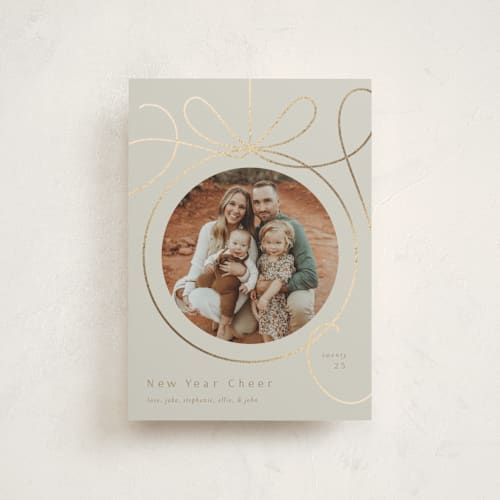This is a cinder christmas postcards with foil pressed by Erin German called ornament frame printing on signature in postcard