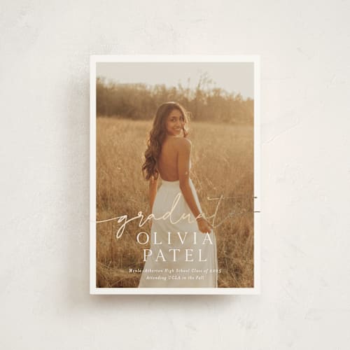 This is a snow graduation announcements with foil pressed by Sarah Curry called graduate script printing on signature in postcard