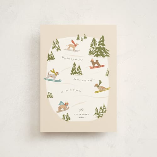 This is a almond petite holiday cards with standard by Vera Lim called snow dogs printing on signature in petite