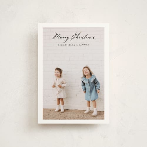 This is a onyx petite holiday cards with standard by Benita Crandall called vintage joy printing on signature in petite