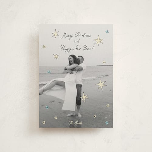 This is a wintermint petite holiday cards with standard by Helena Vitto called the stars printing on signature in petite