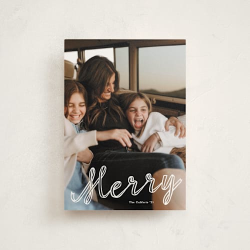 This is a snow petite holiday cards with standard by Lori Wemple called a merry ribbon printing on signature in petite