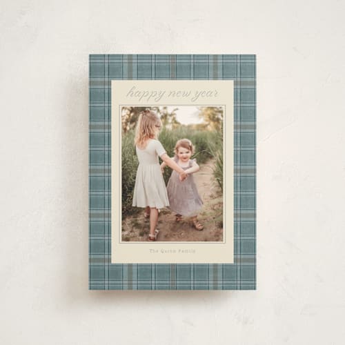 This is a powder blue petite holiday cards with standard by Baumbirdy called traditional plaid printing on signature in petite