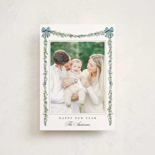 This is a winter berry christmas postcards with standard by Susan Moyal called holly & bows printing on signature in postcard