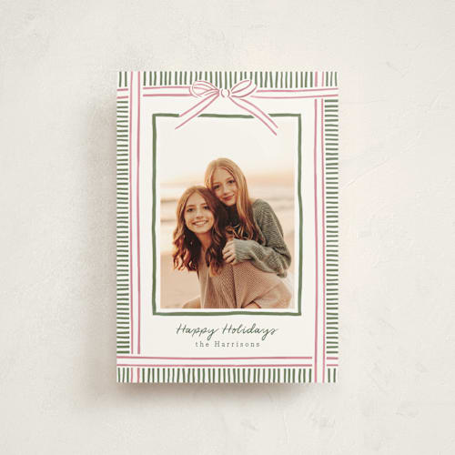 This is a pink sand christmas postcards with standard by Chris Griffith called holiday wrap printing on signature in postcard