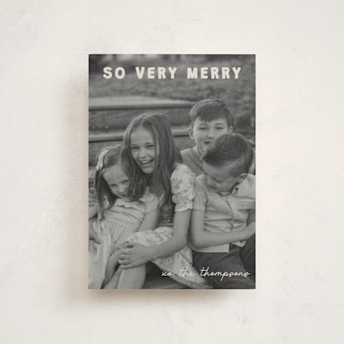 This is a cream christmas postcards with standard by Jenny Millington called merry greeting printing on signature in postcard