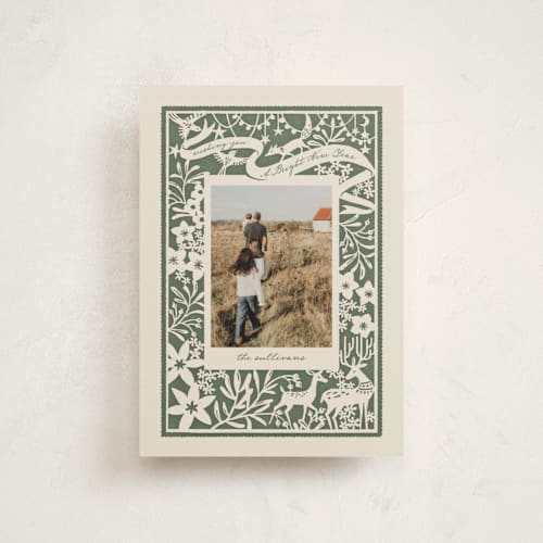 This is a pine christmas postcards with standard by Leia Matt called woodland papercut printing on signature in postcard