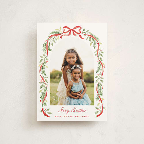 This is a cardinal christmas postcards with standard by Sarah Knight called ribbon arch printing on signature in postcard