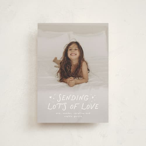 This is a cloud valentine postcards with standard by Lea Delaveris called sending lots of love printing on signature in postcard