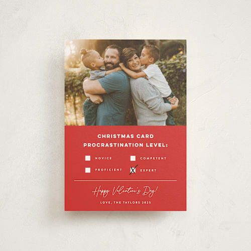 This is a poinsettia valentine postcards with standard by Erica Krystek called procrastination expert printing on signature in postcard