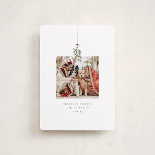 This is a winter petite holiday cards with standard by Randi Cirelli called married and merry printing on recycled smooth signature in petite