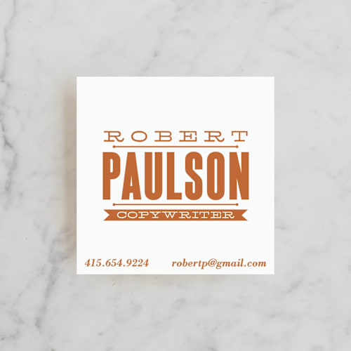 This is a burnt orange business cards by A.C.R. called archive block printing on signature in standard