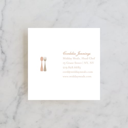 This is a peach business cards by Baci Designer called spoon + fork printing on signature in standard