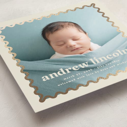 This is a almond foil stamped birth announcements with foil pressed by Creo Study called glimmering ric-rac printing on recycled smooth signature in standard