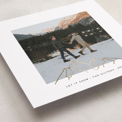 This is a snow foil pressed holiday cards with foil pressed by Gwen Bedat called top of the mountain printing on recycled smooth signature in standard