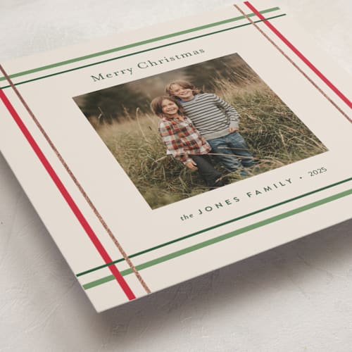 This is a vanilla foil pressed holiday cards with foil pressed by Poised Avenue called perfectly plaid printing on recycled smooth signature in standard