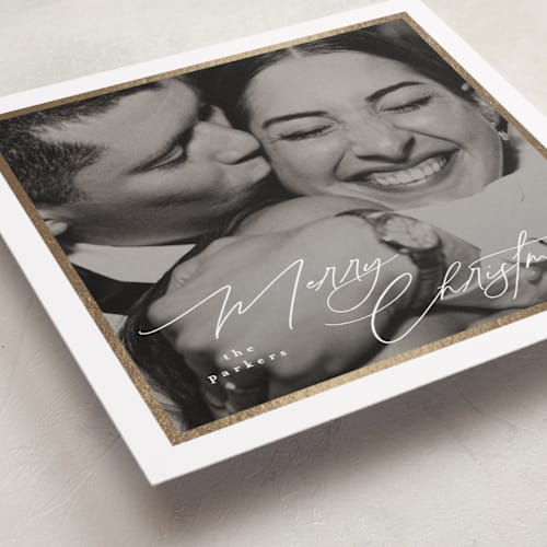 This is a snow foil pressed holiday cards with foil pressed by Tamara Hilje called holiday soneto printing on recycled smooth signature in standard