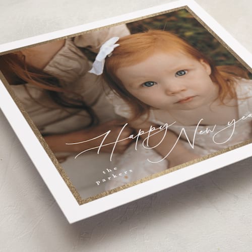 This is a snow foil pressed holiday cards with foil pressed by Tamara Hilje called holiday soneto printing on recycled smooth signature in standard
