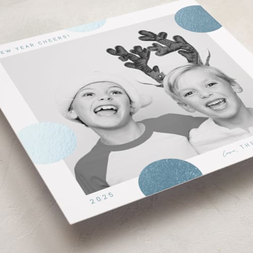 This is a blue jay foil pressed holiday cards with foil pressed by Blustery August called pompom printing on recycled smooth signature in standard