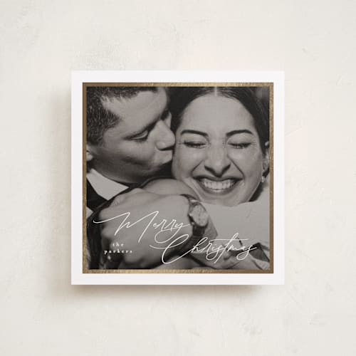 This is a snow foil pressed holiday cards with foil pressed by Tamara Hilje called holiday soneto printing on recycled smooth signature in standard