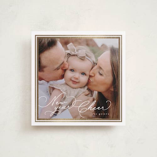 This is a snow foil pressed holiday cards with foil pressed by Tamara Hilje called goldie printing on recycled smooth signature in square