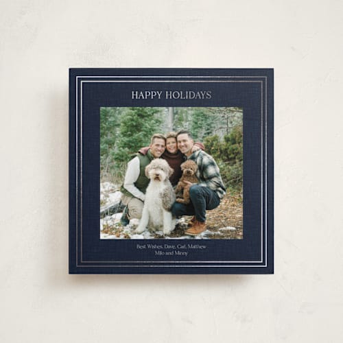 This is a navy foil pressed holiday cards with foil pressed by Tina Faselli called traditional linen printing on recycled smooth signature in square