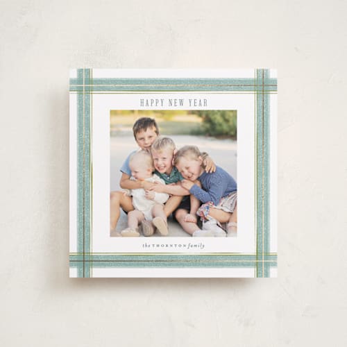 This is a wintermint foil pressed holiday cards with foil pressed by Paula Pecevich called brushed plaid printing on recycled smooth signature in square