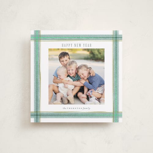 This is a wintermint foil pressed holiday cards with foil pressed by Paula Pecevich called brushed plaid printing on recycled smooth signature in square