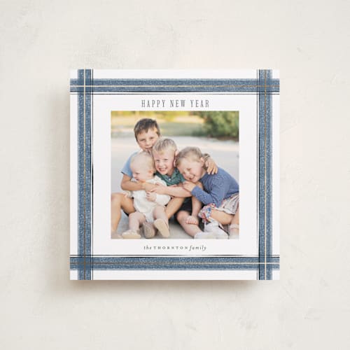 This is a blue spruce foil pressed holiday cards with foil pressed by Paula Pecevich called brushed plaid printing on recycled smooth signature in square